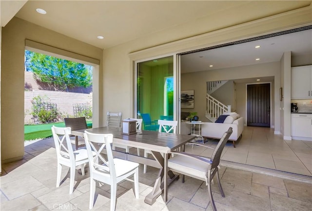 54 Rim Crst, Irvine, CA 92602 - view of patio / terrace featuring fence and outdoor dining area