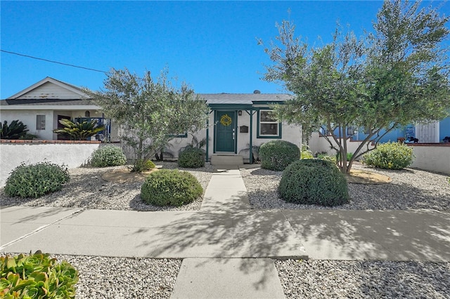 ranch-style home with stucco siding