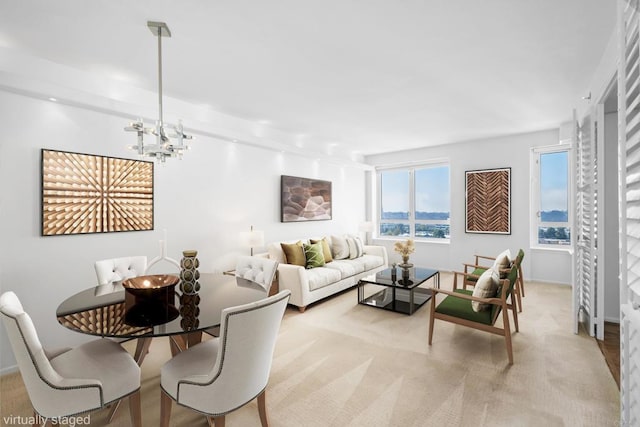 dining space with carpet flooring and a notable chandelier