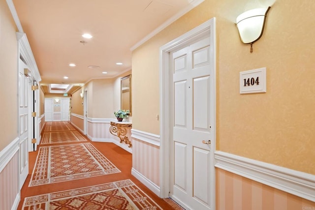 hallway with recessed lighting and crown molding