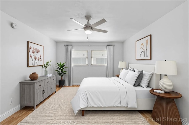 5055 Coldwater Canyon Ave Unit 105, Sherman Oaks, CA 91423 - bedroom with light wood-style flooring, baseboards, and ceiling fan
