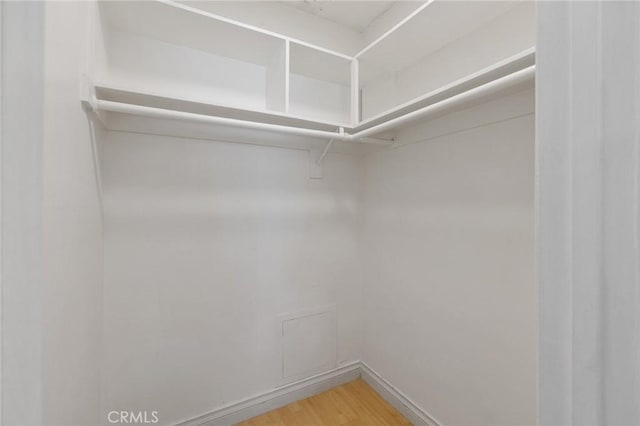 5055 Coldwater Canyon Ave Unit 105, Sherman Oaks, CA 91423 - spacious closet featuring light wood finished floors