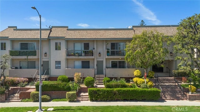 5055 Coldwater Canyon Ave Unit 105, Sherman Oaks, CA 91423 - view of building exterior with stairs