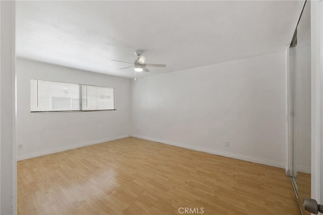 5055 Coldwater Canyon Ave Unit 105, Sherman Oaks, CA 91423 - empty room with a ceiling fan, light wood-style flooring, and baseboards