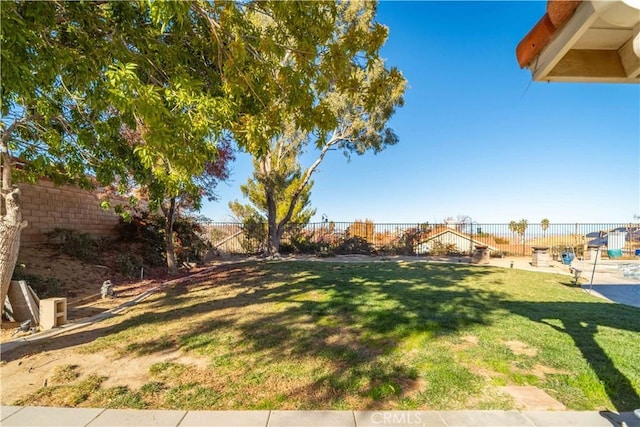 view of yard with a fenced backyard