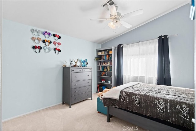 carpeted bedroom with ceiling fan, vaulted ceiling, and baseboards