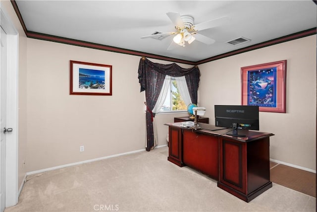 office area featuring crown molding, baseboards, light carpet, and visible vents