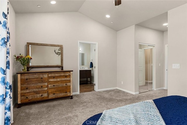 bedroom featuring baseboards, recessed lighting, connected bathroom, high vaulted ceiling, and carpet