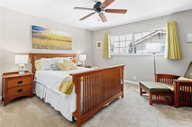 bedroom featuring baseboards, carpet flooring, and ceiling fan