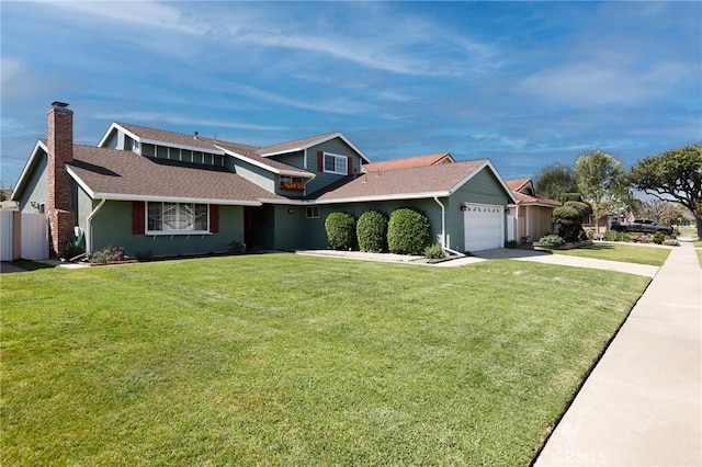 traditional-style house with stucco siding, a front yard, fence, an attached garage, and concrete driveway