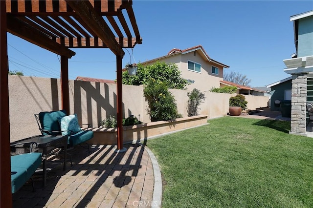 view of yard featuring a pergola, a patio area, and a fenced backyard