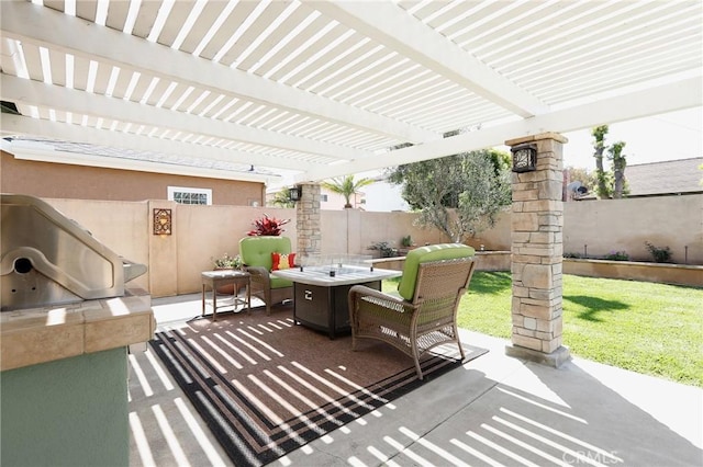 view of patio with a fenced backyard, an outdoor fire pit, and a pergola