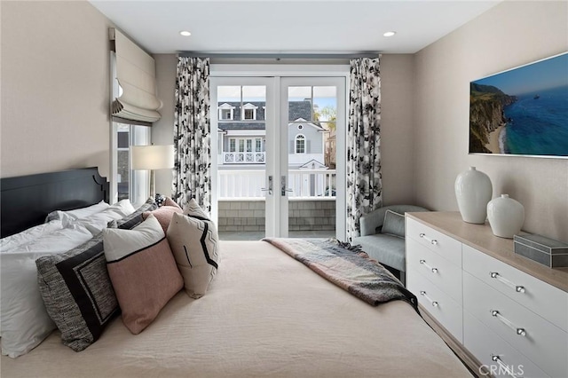 bedroom featuring french doors and access to exterior