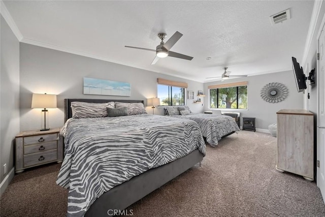 carpeted bedroom featuring ornamental molding, baseboards, a ceiling fan, and visible vents