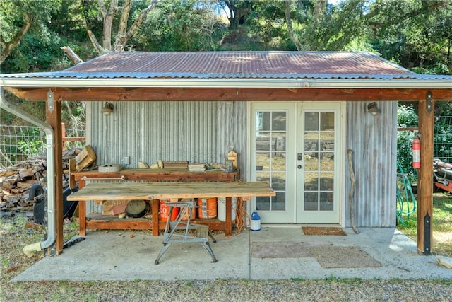 view of outbuilding featuring french doors