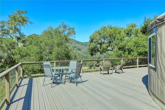 deck featuring outdoor dining space