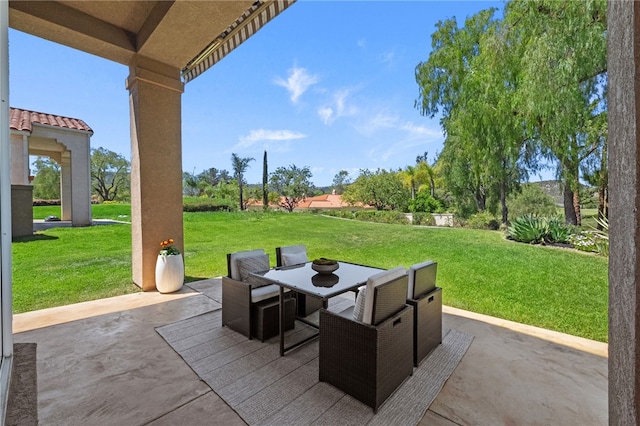 view of patio with outdoor dining area