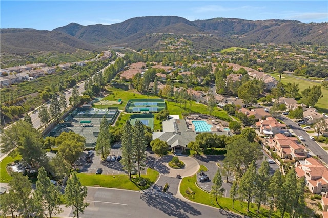aerial view with a mountain view and a residential view