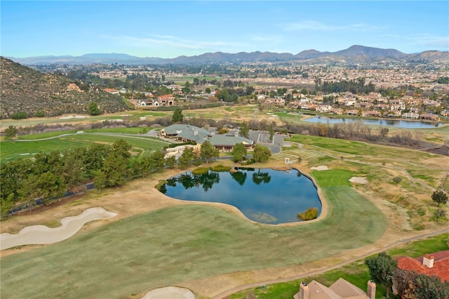 birds eye view of property featuring a residential view, golf course view, and a water and mountain view