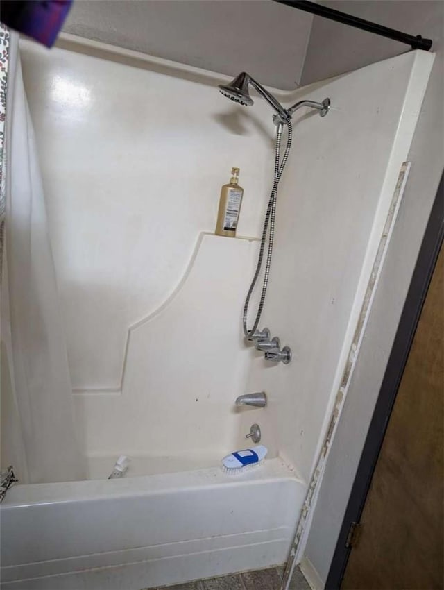 bathroom with shower / bathing tub combination