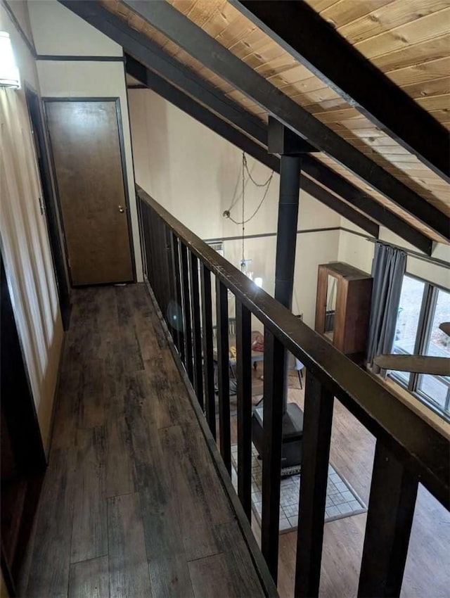 hallway with wood ceiling, stairs, hardwood / wood-style floors, and vaulted ceiling with beams