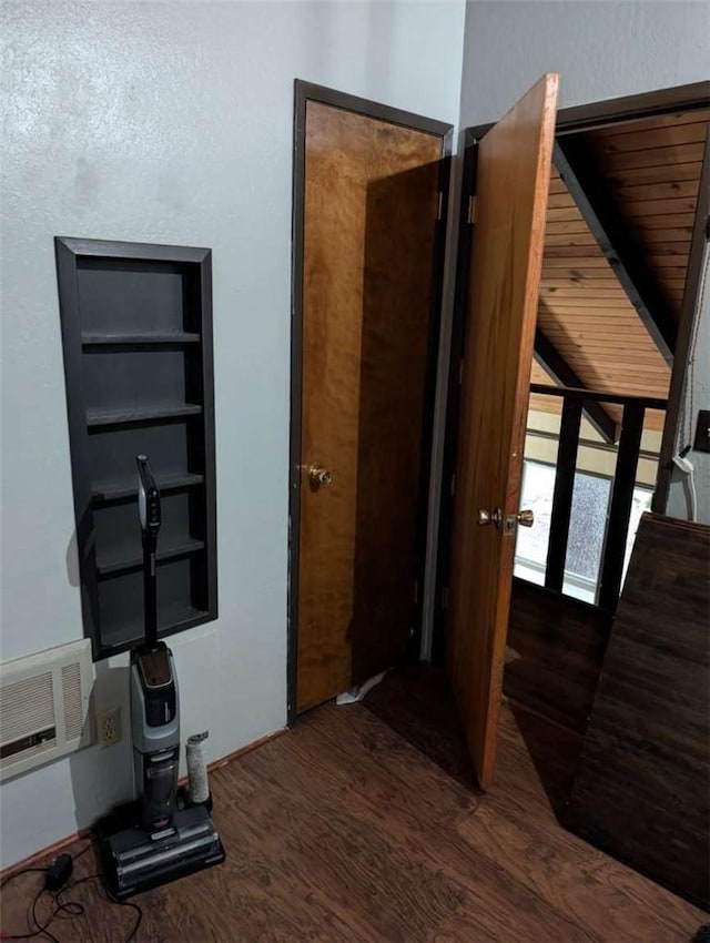 unfurnished bedroom featuring wood finished floors