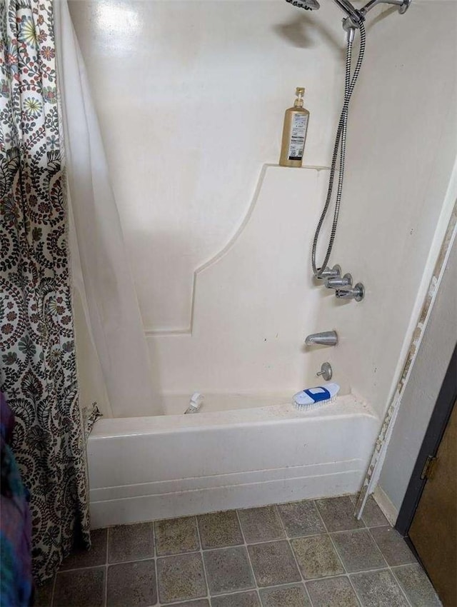 bathroom featuring shower / bath combination with curtain