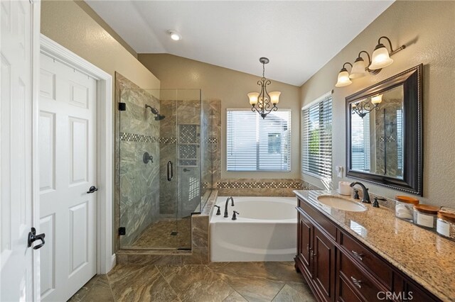 42984 Calle Reva, Temecula, CA 92592 - full bath featuring a notable chandelier, a shower stall, a garden tub, vanity, and lofted ceiling