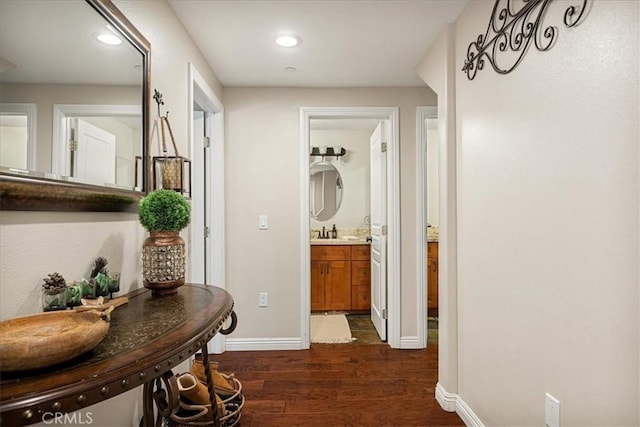30964 Summit Dr, Running Springs, CA 92382 - hallway featuring a sink, baseboards, dark wood finished floors, and recessed lighting