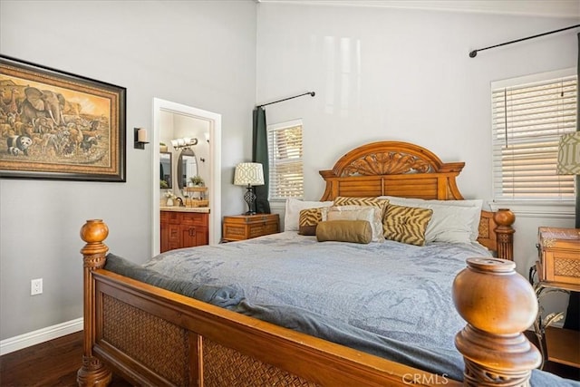 30964 Summit Dr, Running Springs, CA 92382 - bedroom featuring dark wood-type flooring, baseboards, and ensuite bath