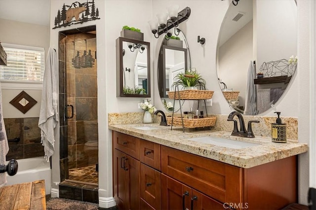 30964 Summit Dr, Running Springs, CA 92382 - bathroom featuring double vanity, visible vents, a sink, and a stall shower