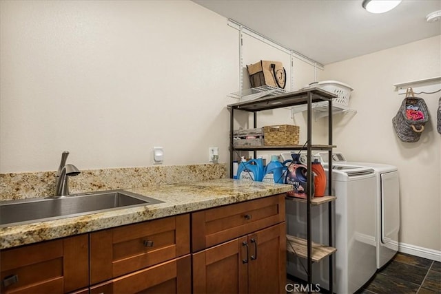 30964 Summit Dr, Running Springs, CA 92382 - clothes washing area with washing machine and dryer, baseboards, and a sink