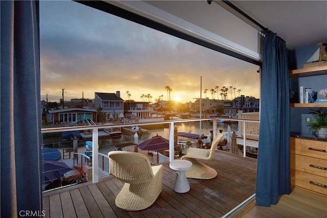 3601 Finley Ave, Newport Beach, CA 92663 - balcony at dusk with a water view and a residential view