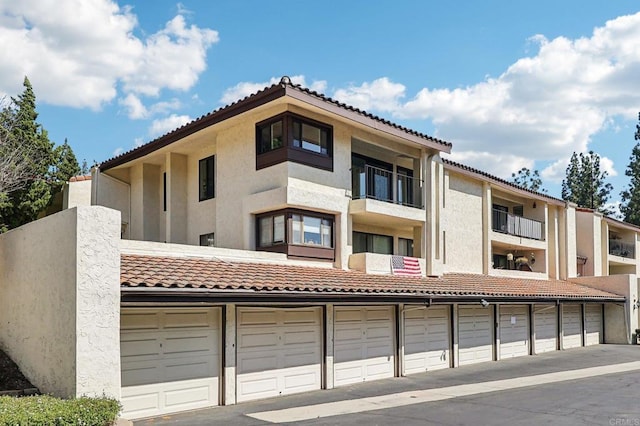 17607 Pomerado Rd Unit 204, San Diego, CA 92128 - view of property featuring community garages