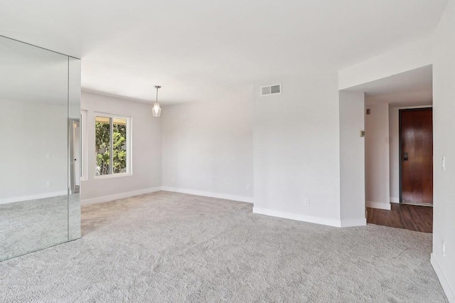 17607 Pomerado Rd Unit 204, San Diego, CA 92128 - carpeted spare room with baseboards and visible vents
