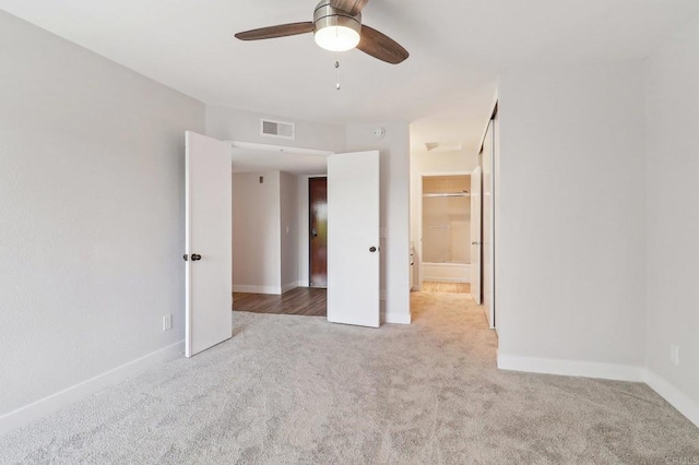 17607 Pomerado Rd Unit 204, San Diego, CA 92128 - carpeted empty room featuring baseboards, visible vents, and ceiling fan