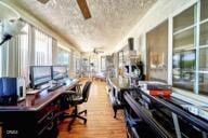 9975 Custer Ave, Lucerne Valley, CA 92356 - home office with wood finished floors