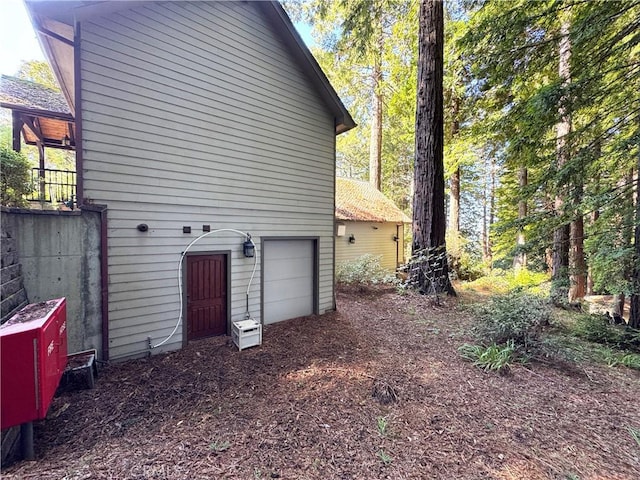 24250 Pacific Heights Dr, Westport, CA 95488 - view of side of property featuring a garage