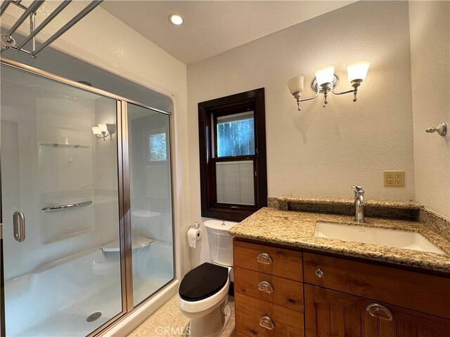 24250 Pacific Heights Dr, Westport, CA 95488 - full bathroom with a shower stall, recessed lighting, vanity, and toilet