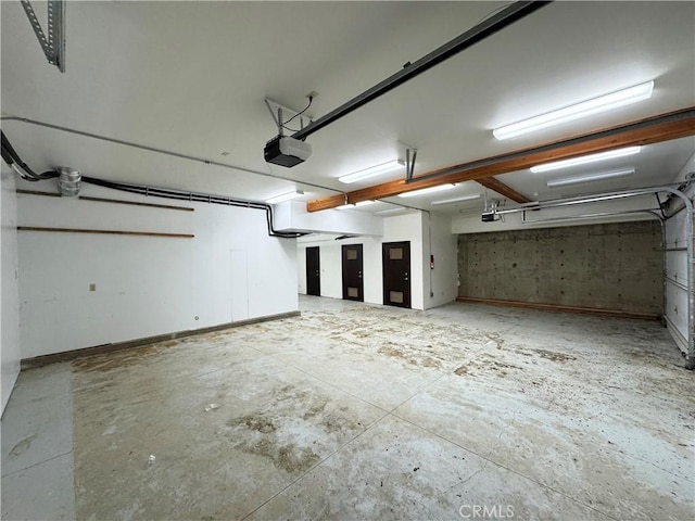 24250 Pacific Heights Dr, Westport, CA 95488 - garage featuring a garage door opener
