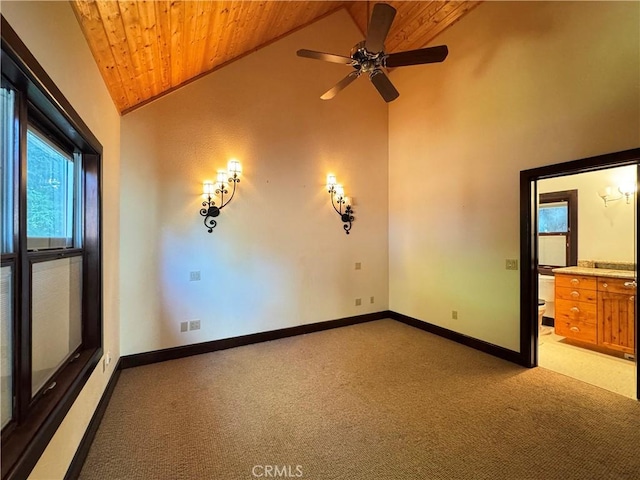 24250 Pacific Heights Dr, Westport, CA 95488 - unfurnished room with baseboards, light carpet, a ceiling fan, high vaulted ceiling, and wood ceiling