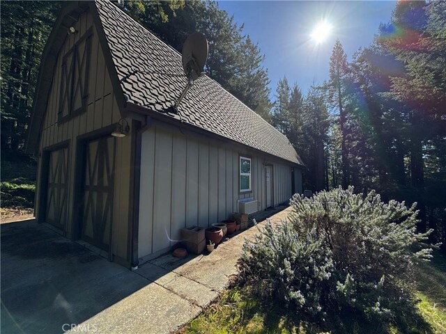 24250 Pacific Heights Dr, Westport, CA 95488 - view of property exterior with board and batten siding and central air condition unit