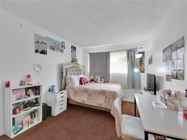 bedroom featuring a textured ceiling and carpet floors