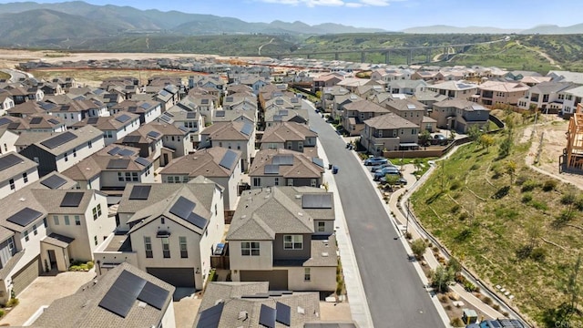 1751 Whitmore Loop, Chula Vista, CA 91913 - aerial view of property and surrounding area with nearby suburban area and a mountainous background