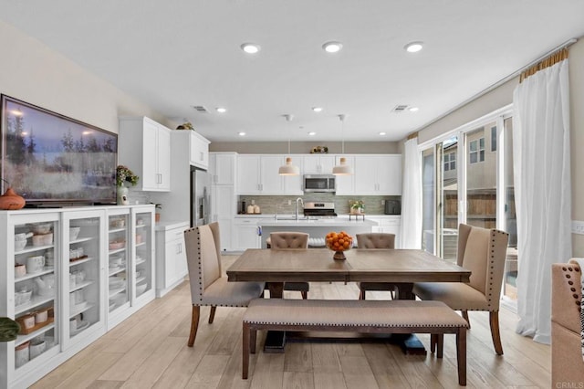 1751 Whitmore Loop, Chula Vista, CA 91913 - dining area with light wood-style flooring and recessed lighting