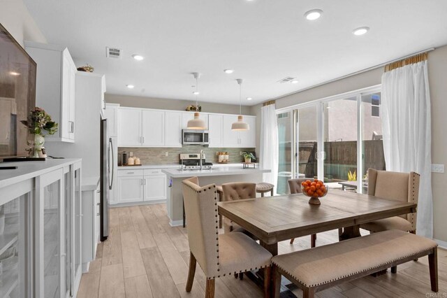 1751 Whitmore Loop, Chula Vista, CA 91913 - dining area featuring light wood-style flooring and recessed lighting