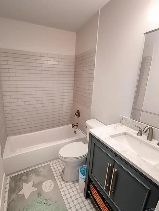 bathroom with toilet and vanity