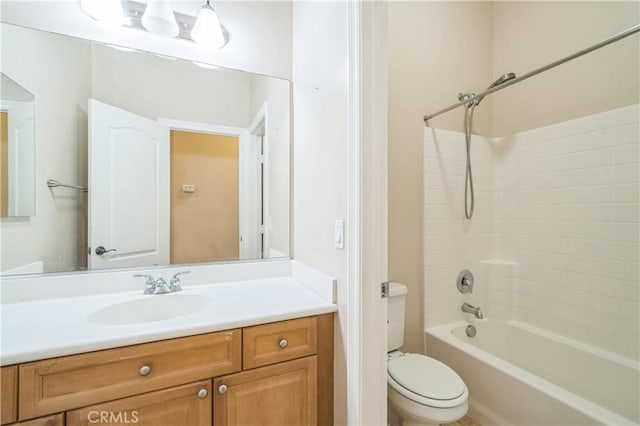 full bathroom featuring toilet, shower / tub combination, and vanity