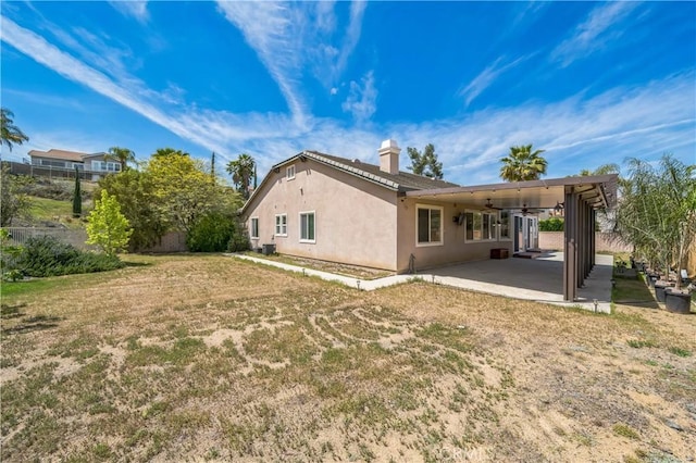 2 Villa Roma St, Lake Elsinore, CA 92532 - rear view of property with a chimney, a patio area, ceiling fan, and stucco siding