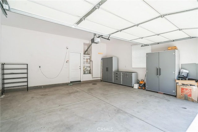 garage featuring a garage door opener